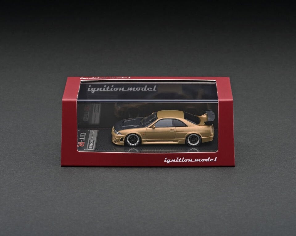 IG2509 Nissan R33 GT-R Mat Altın 1:64