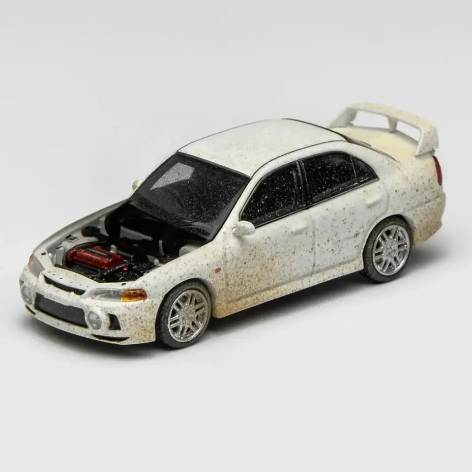 MOTORHELİX MITSUBISHI LANCER EVOLUTION IV MUDDY VER. WITH RALLY LIGHT 1:64