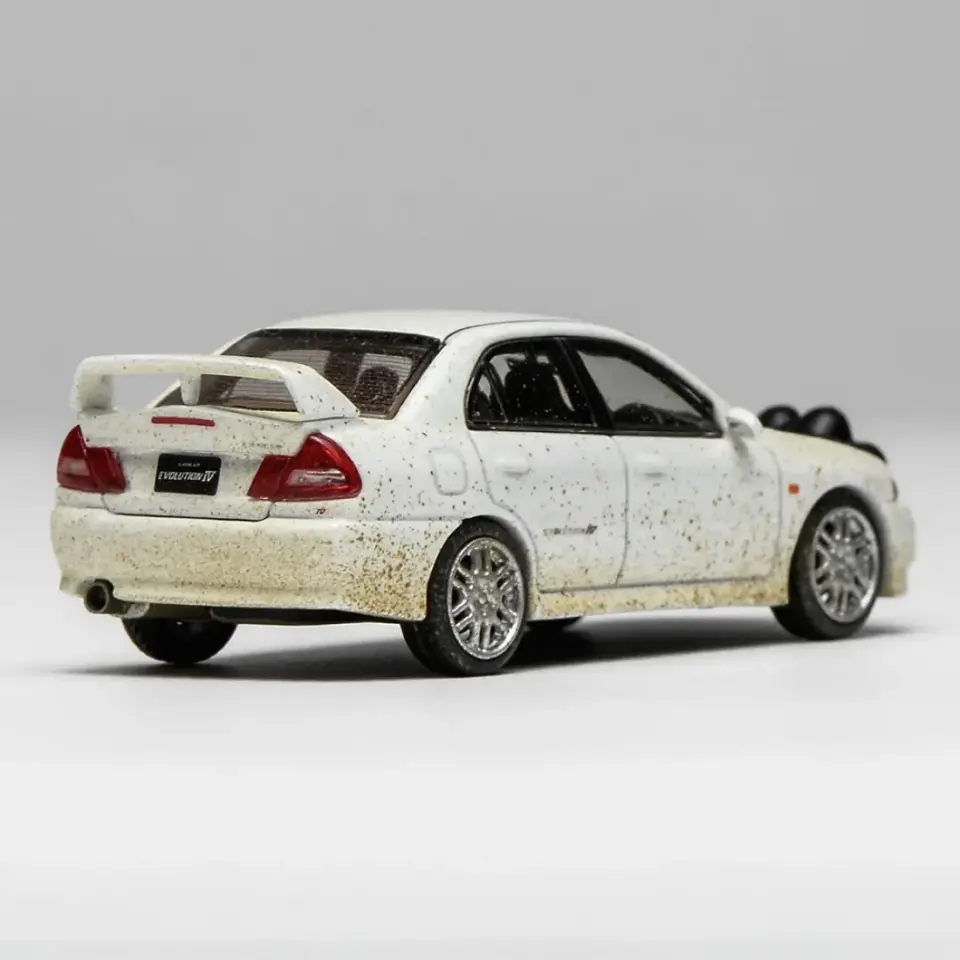 MOTORHELİX MITSUBISHI LANCER EVOLUTION IV MUDDY VER. WITH RALLY LIGHT 1:64