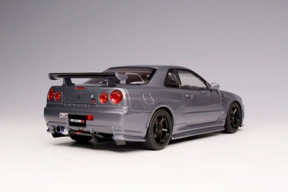 MOTORHELIX NISSAN SKYLINE GT-R (R34) NISMO CRS VER. GUN METALLIC 1:18 (M83409)