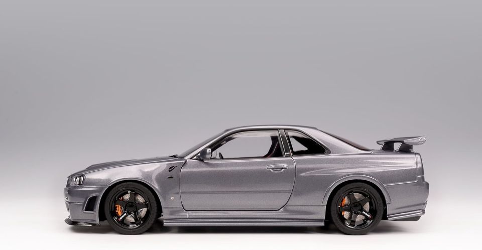 MOTORHELIX NISSAN SKYLINE GT-R (R34) NISMO CRS VER. GUN METALLIC 1:18 (M83409)