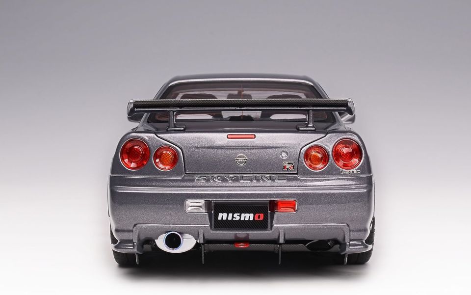 MOTORHELIX NISSAN SKYLINE GT-R (R34) NISMO CRS VER. GUN METALLIC 1:18 (M83409)