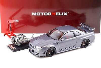 MOTORHELIX NISSAN SKYLINE GT-R (R34) NISMO CRS VER. GUN METALLIC 1:18 (M83409)